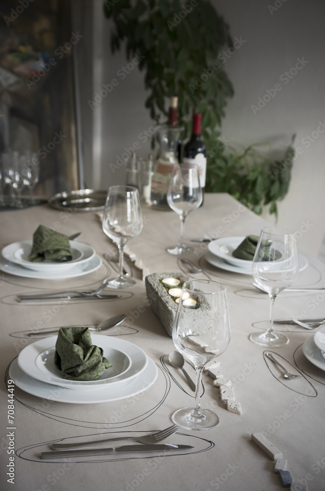 Festive laid table with individual table decoration Festive laid table with individual table decoration
