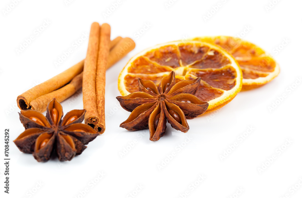 dry orange, cinnamon and Star Anise with copy space, on white ba dry orange, cinnamon and Star Anise with copy space, on white ba