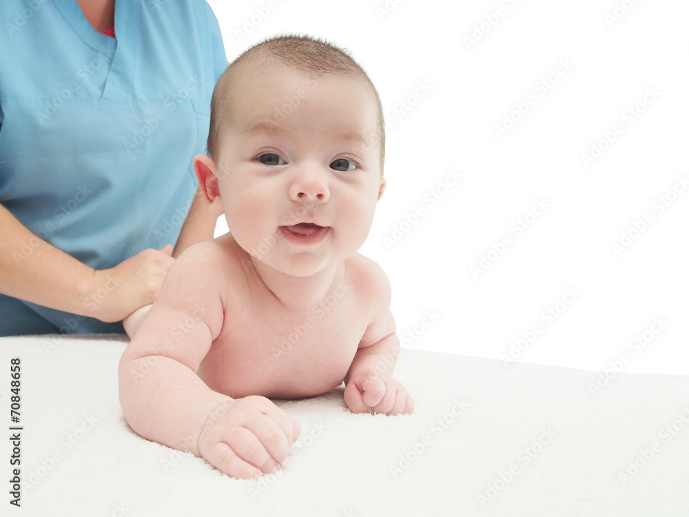 Doctor massage small caucasian baby isolated Doctor massage small caucasian baby isolated