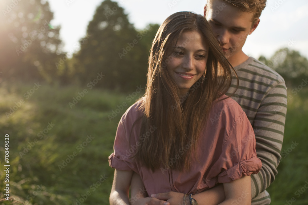 Germany, Berlin, Teenage couple smiling Germany, Berlin, Teenage couple smiling