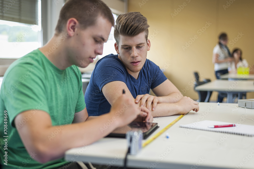 Two vocational school students in class room Two vocational school students in class room