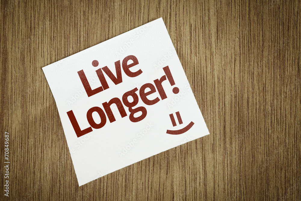 Live Longer on Paper Note with texture background Live Longer on Paper Note with texture background