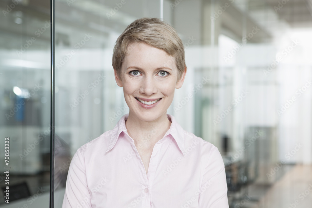 Germany, Munich, Businesswoman in office Germany, Munich, Businesswoman in office