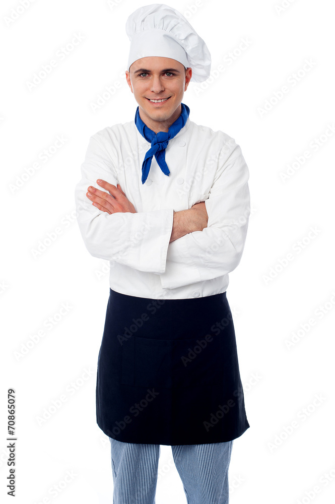 Confident young chef with arms crossed Confident young chef with arms crossed