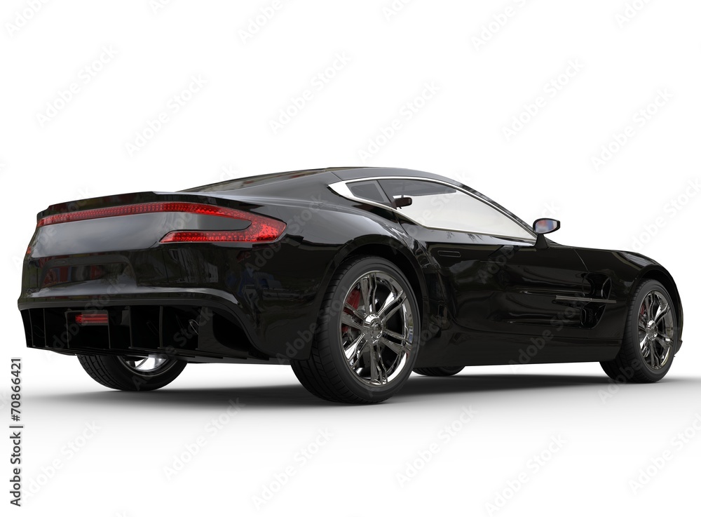 Black luxury sports car on white background - tail view