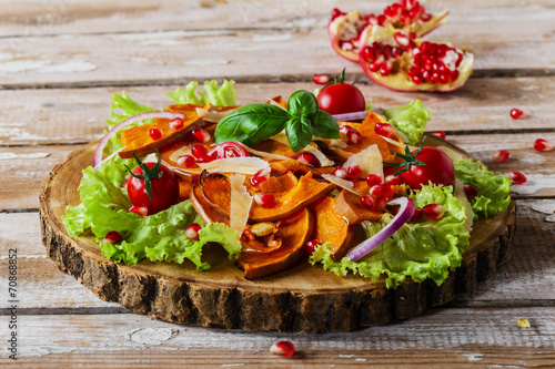 salad of roasted pumpkin and pomegranate cherry tomatoes