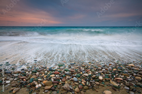 Cloudy sunset on a beach in Crete, Greece.