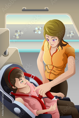 Mother strapping seatbelt on her child car seat