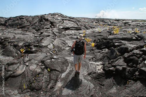 Man Hiking on Cooled Lava