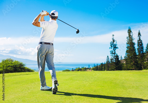 Man Playing Golf, Hitting Ball from the Tee