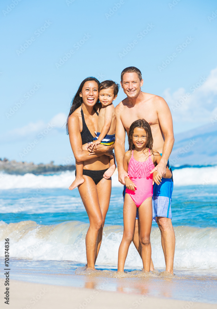 Happy Mixed Race Family on the Beach