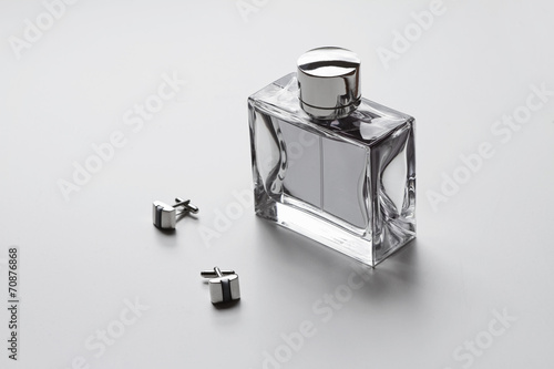 Obraz na płótnie Horizontal mens cologne and cufflinks