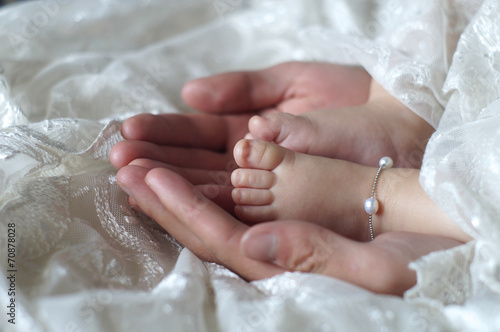 Baby feet in fother's hands