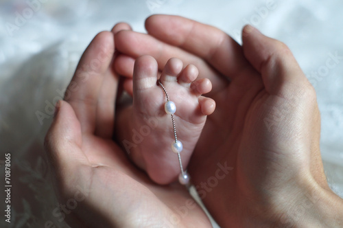 Baby feet in fother's hands