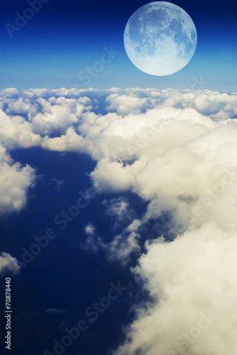 Blue sky, clouds and moon