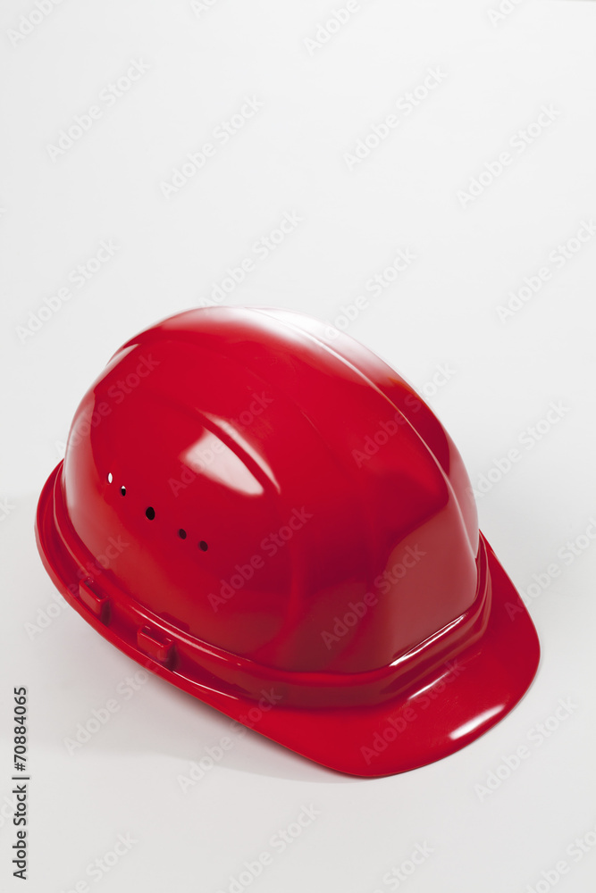 Fototapeta premium Roter Bauhelm, Bauen, Schutzhelm, Freisteller