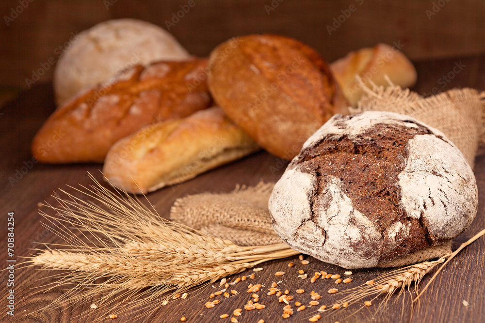 Fresh bread with ears of wheat