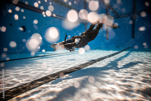 Freediver Performing during a DYN Freediving Competition photo