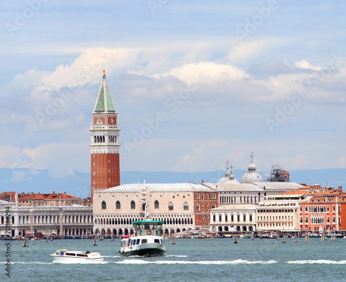 Venice with the bell tower of Saint Mark and the boats into the