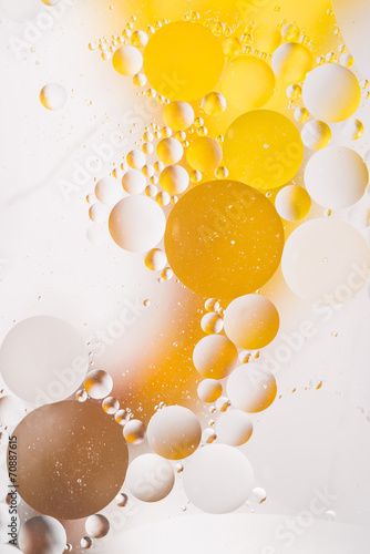 Bubbles on yellow abstract background