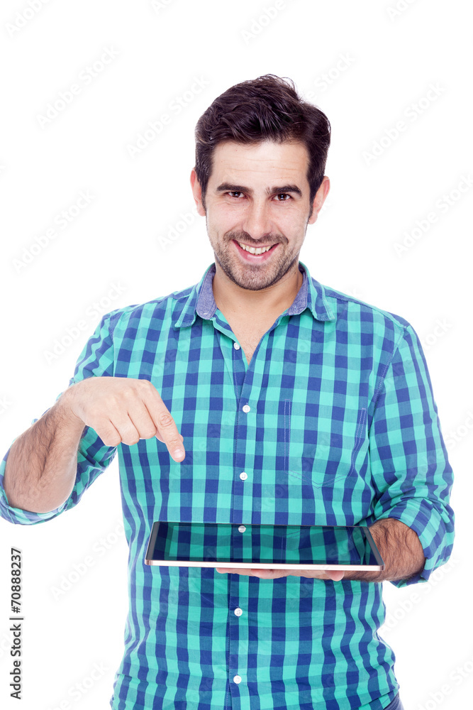 Handsome latin man using a tablet computer, isolated over a whit Handsome latin man using a tablet computer, isolated over a whit