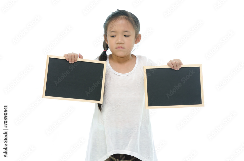 Little asian girl holding two black boards on white background Little asian girl holding two black boards on white background