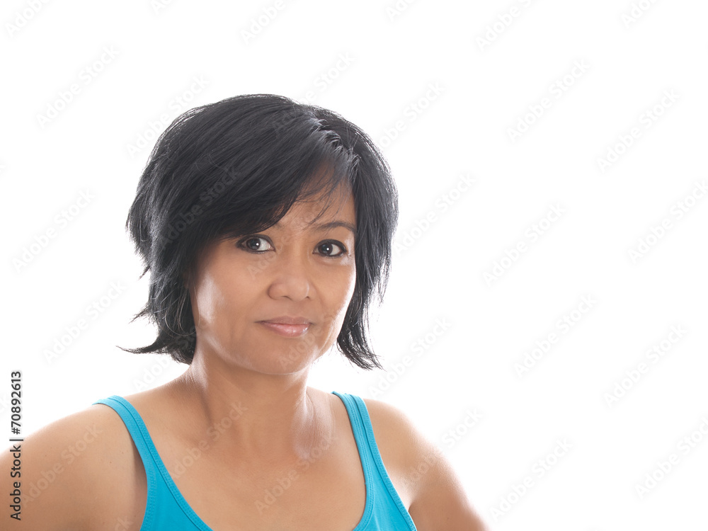 middle aged asian woman in blue sleeveless shirt middle aged asian woman in blue sleeveless shirt
