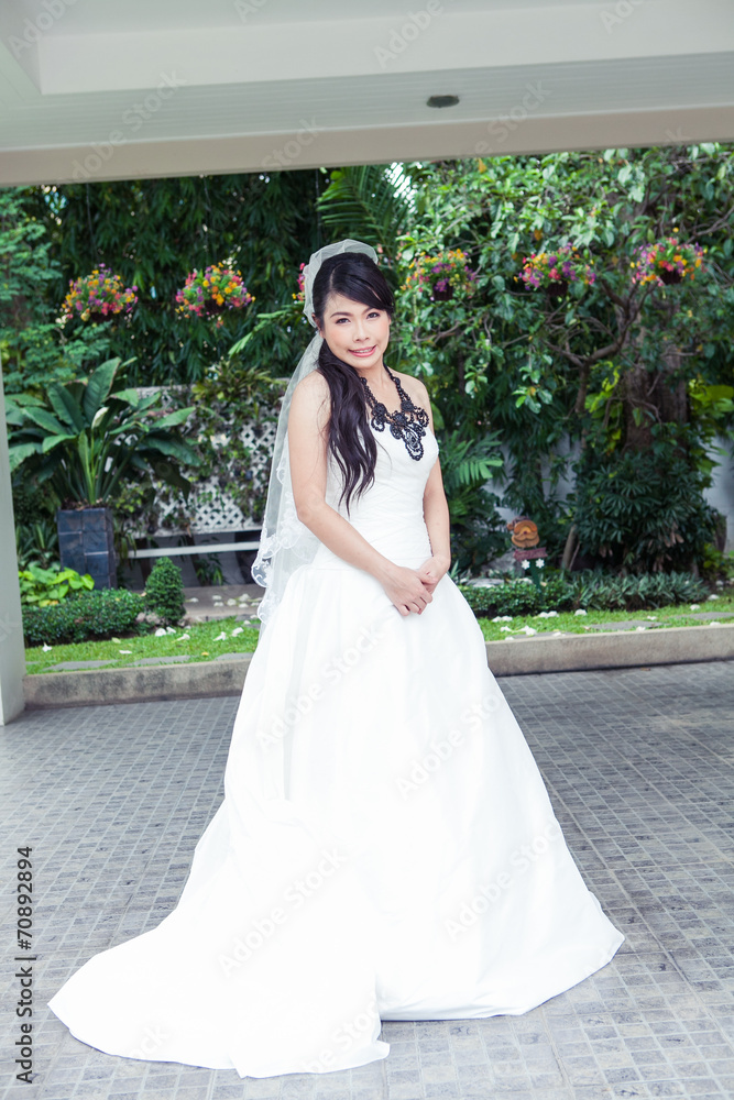 Beauty young bride in white dress