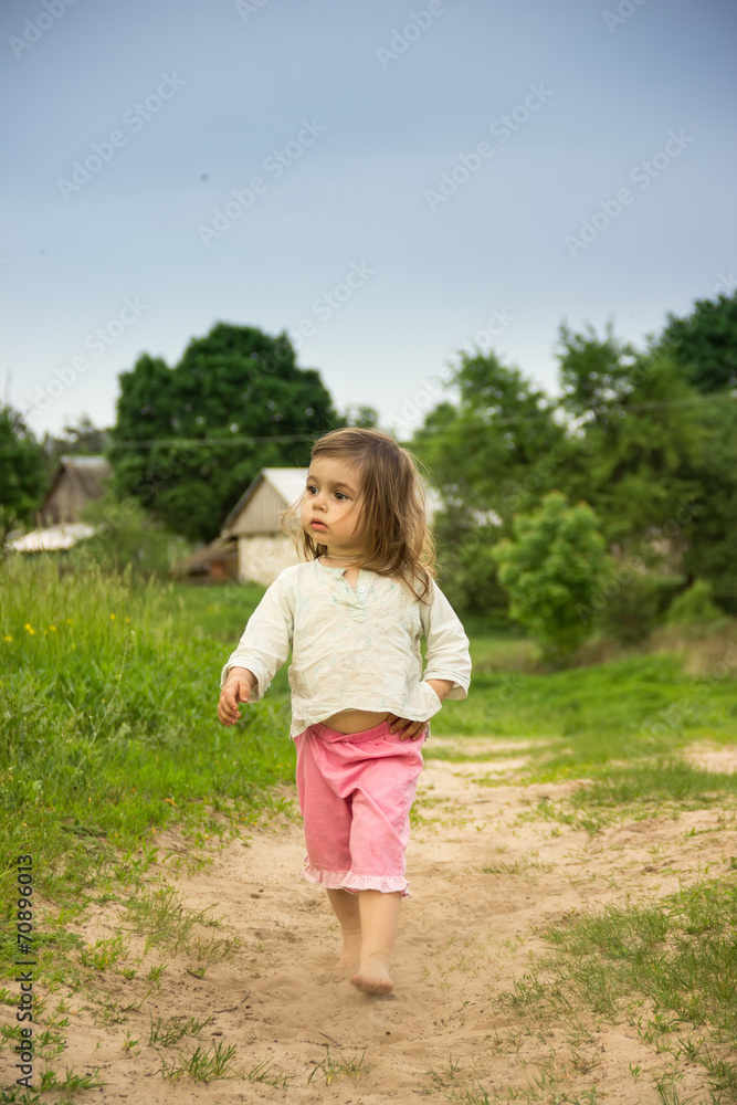 portrait of Cute kid having fun at countryside in summer day portrait of Cute kid having fun at countryside in summer day