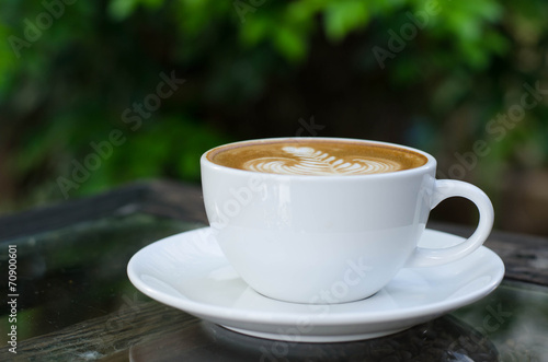 white cup of hot coffee outdoor