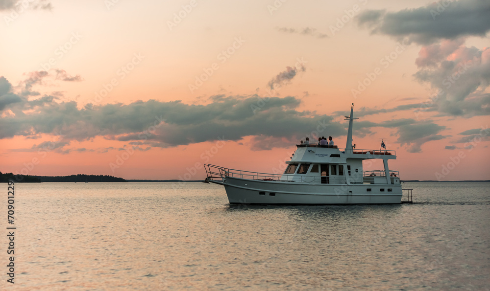 White ship at sunset