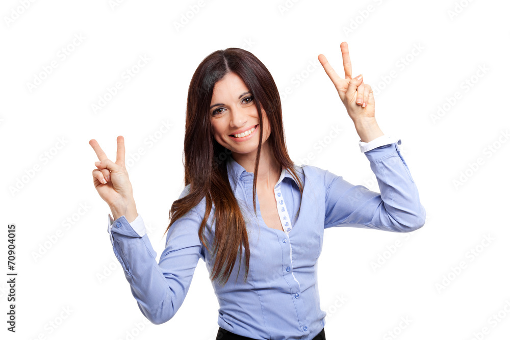 Smiling businesswoman showing victory sign