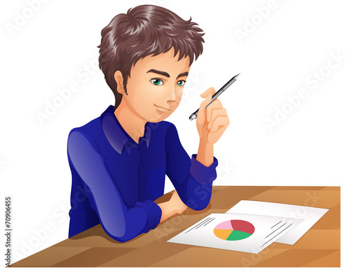 A boy thinking while taking an exam
