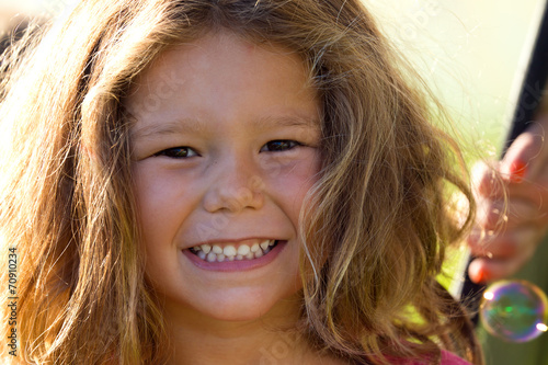 Beautiful children having fun in the park.