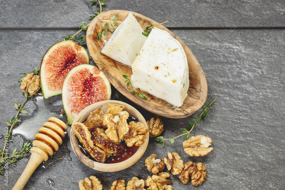 Fototapeta premium Fresh Figs with Spiced Honey and Goat Cheese.