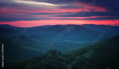 Sunrise over the mountain hills © Aleksey Sagitov