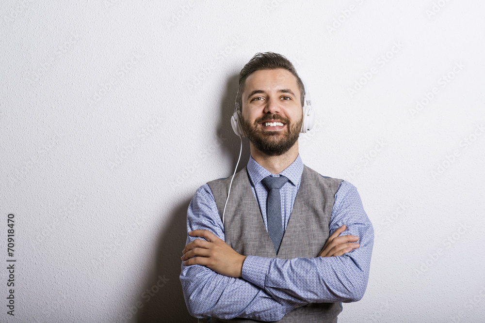 Hipster businessman with headphones Hipster businessman with headphones