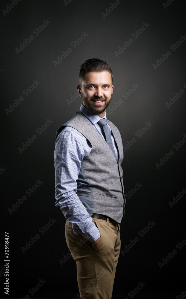 Hipster businessman in studio