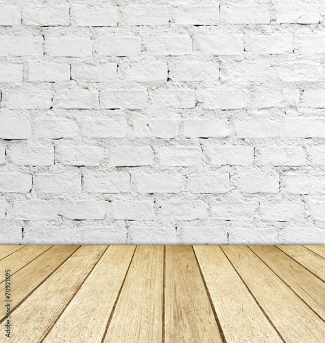 White brick wall and wood floor  empty perspective room.
