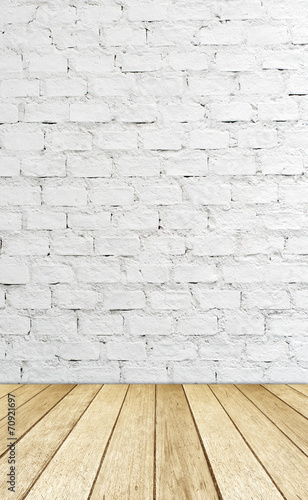 White brick wall and wood floor, empty perspective room.