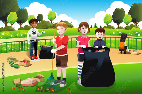 Kids volunteering cleaning up the park