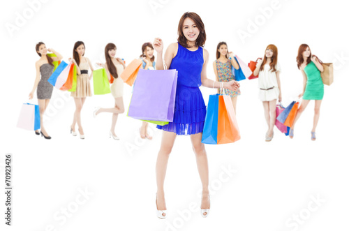 happy asian shopping women holding color bags.
