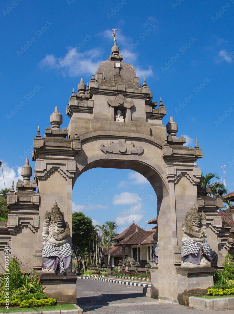 City gate with figures of security guards. Bali, Indonesia