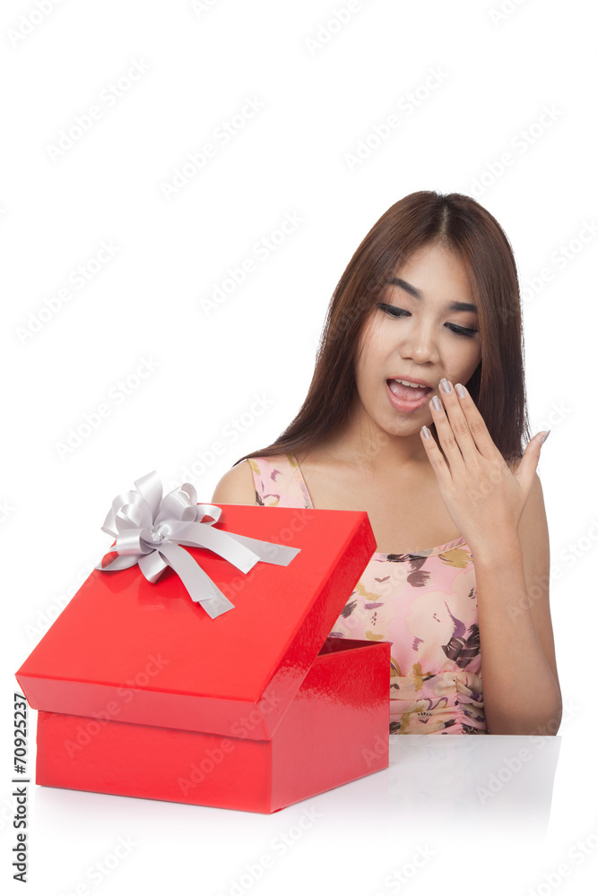 Excited beautiful Asian woman open a red gift box Excited beautiful Asian woman open a red gift box