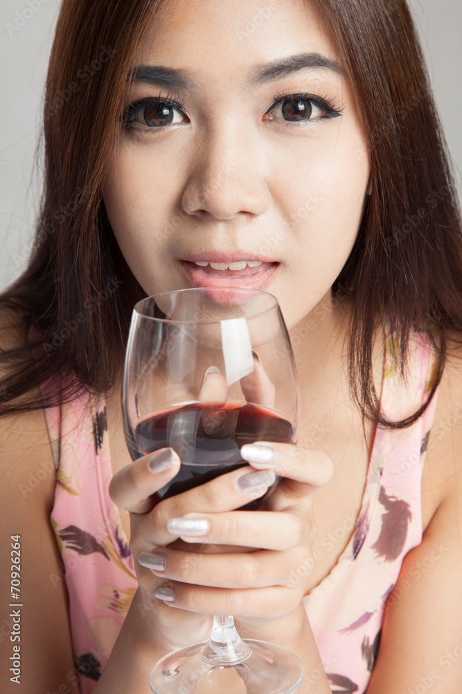 Beautiful Asian woman hold glass of red wine Beautiful Asian woman hold glass of red wine