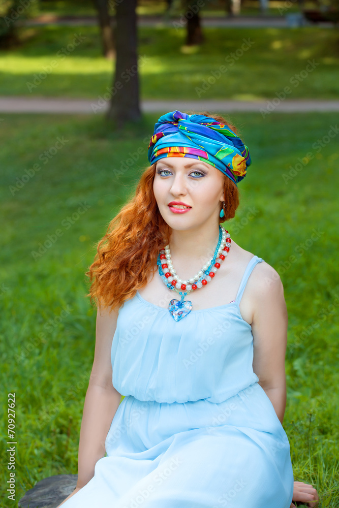 girl wearing a turban and a blue dress girl wearing a turban and a blue dress