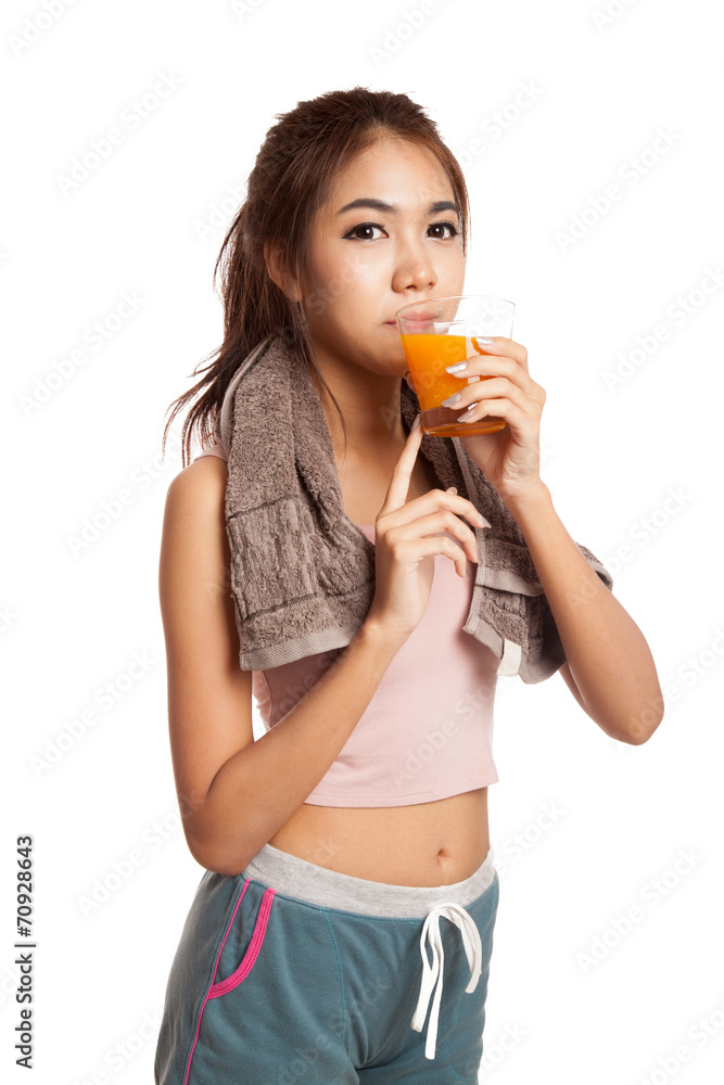 Asian healthy workout girl drinking orange juice Asian healthy workout girl drinking orange juice