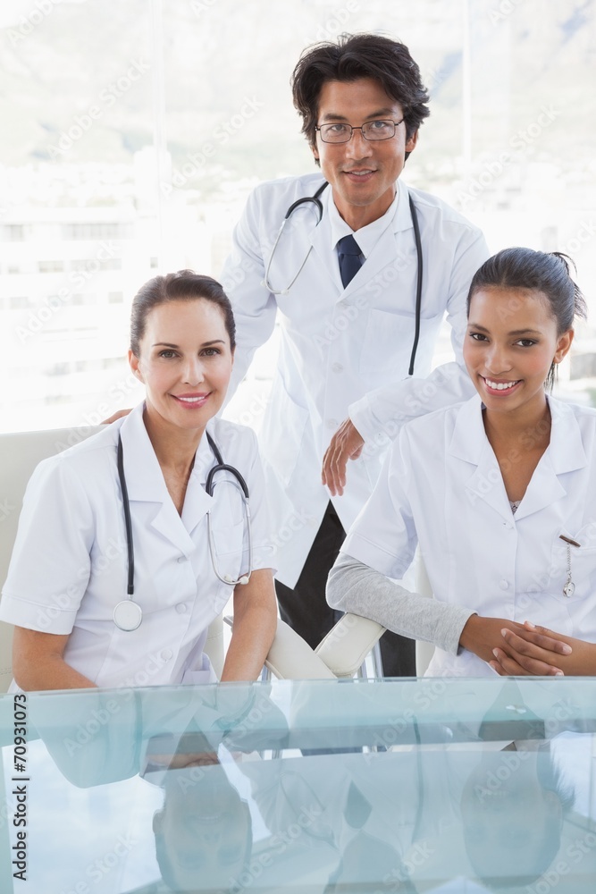 Fototapeta premium Smiling doctors looking at camera