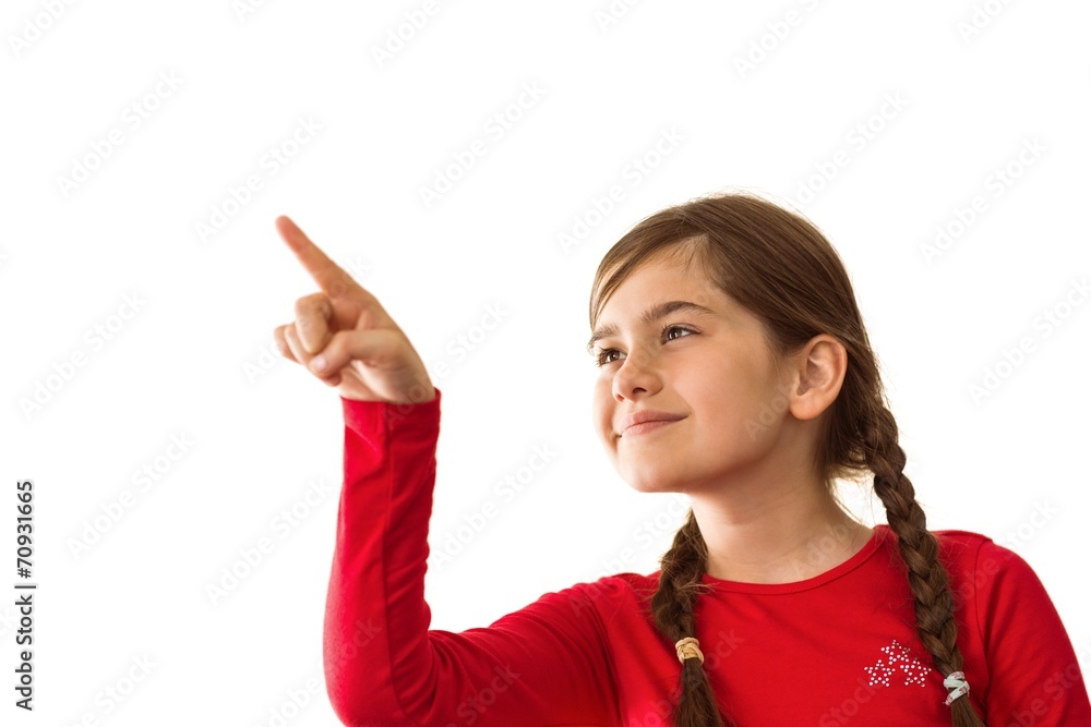 Cute little girl smiling and pointing Cute little girl smiling and pointing