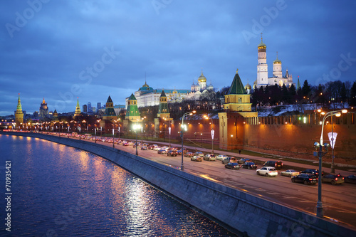 Traffic on Kremlin embankment against Ivan Great bell tower